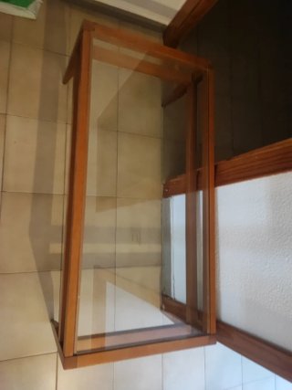 Mesa de centro rectangular de madera y cristal