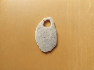 Piezas de pasta grande beige
