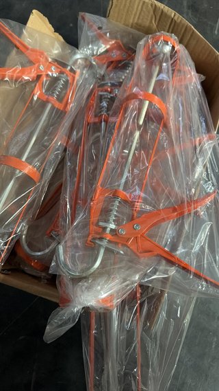 Pistola de silicona naranja