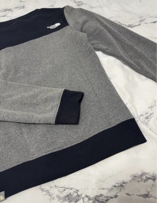 Sudadera The North Face gris y negra