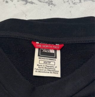 Sudadera The North Face gris y negra