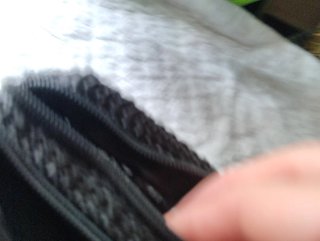 Bolso de mano negro con pedrería
