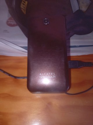 Teléfono Alcatel One Touch con Cargador Original