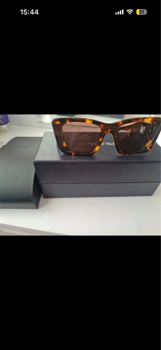 Gafas de sol Prada marrones