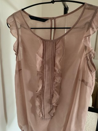 Blusa rosa palo con volantes