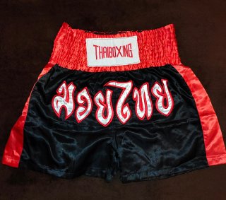 Pantalones Muay Thai Negros y Rojos.