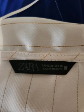Blusa blanca con rayas