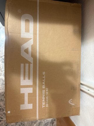 Caja pelotas de tennis