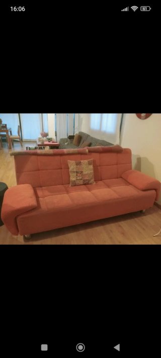 Sofá cama naranja de tela