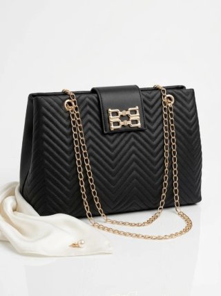 Bolso negro y dorado