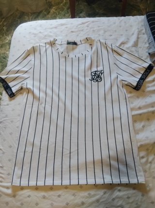 Varias camisetas y pantalones.todo en buen estado