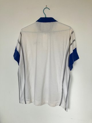Polo Dunlop Vintage Blanco y Azul