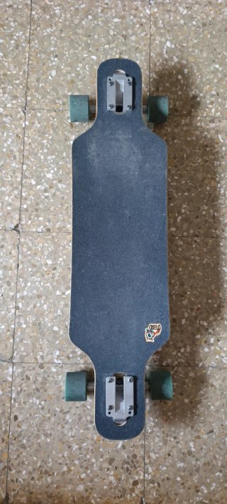 Longboard Oxelo en perfecto estado.