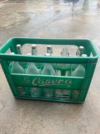 Scatola La Casera con 9 bottiglie antiche