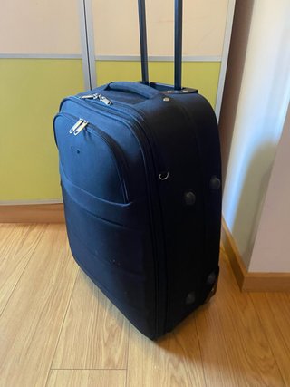 Maleta de viaje azul con ruedas 23kg