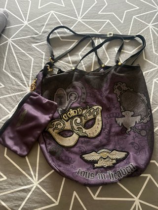 Bolso Tous Morado con Mascara y Alas