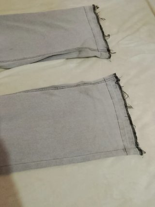 Pantalón flared gris claro