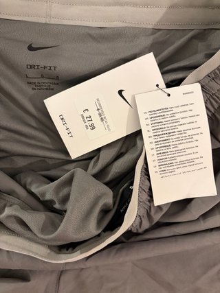 Pantalones cortos running Nike grises