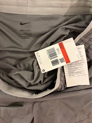 Pantalones cortos running Nike grises