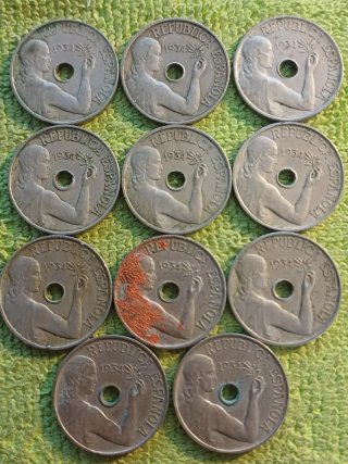 23 monedas de 25 céntimos de 1934