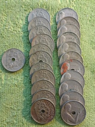23 monedas de 25 céntimos de 1934