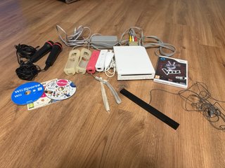 Consola Nintendo Wii con juegos y accesorios
