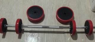 Mancuernas ajustables con discos rojos