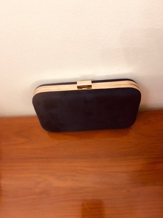 Bolso de mano azul marino de terciopelo
