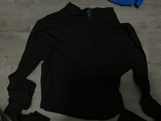 Top cremallera negro manga larga