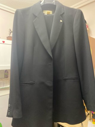Traje chaqueta y pantalón negro