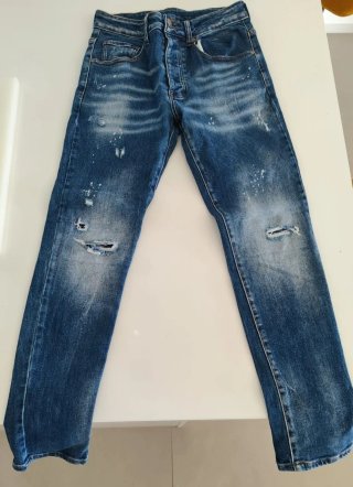 Jeans uomo blu strappati indossati una volta