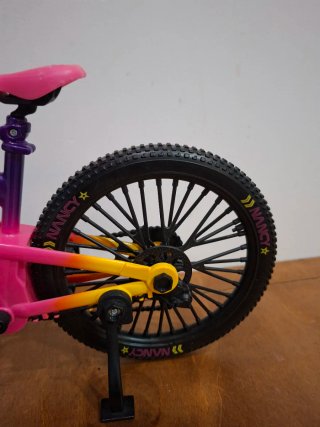 Bicicleta de juguete para muñeca Nancy