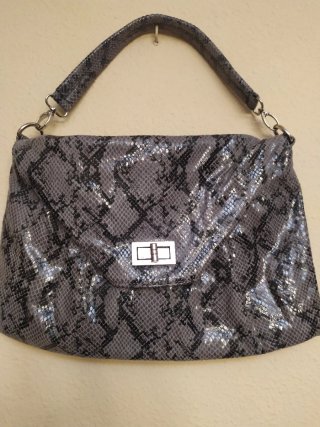 Bolso de hombro tipo clutch estampado