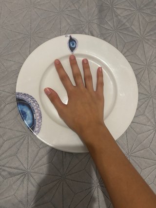 Plato de cerámica con diseño de Dalí