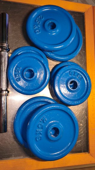 2 Mancuernas Ajustables + 4 de 2.5kg + 4 de 1.5kg