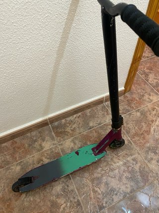 Patinete freestyle morado y verde