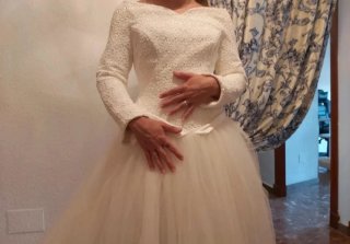 Vestido de novia con cuerpo de encaje