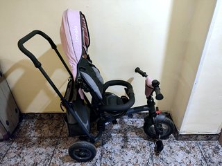 Triciclo infantil Lionelo rosa con capota