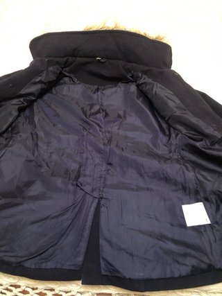 Parka azul con capucha y pelo