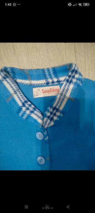 Pijama de felpa azul con oso