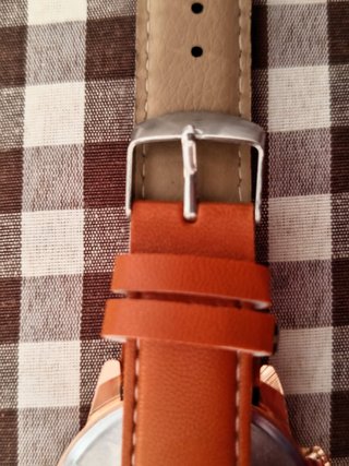 Conjunto de reloj y pulseras de cuero