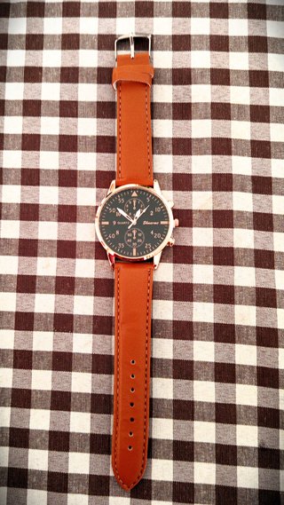 Conjunto de reloj y pulseras de cuero