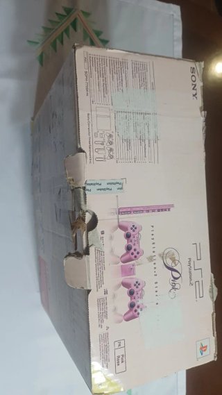 Caja Play2 slim rosa con manuales