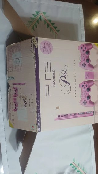 Caja Play2 slim rosa con manuales