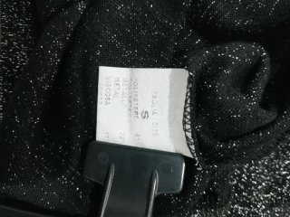 Top collo alto nero con fili argento tg S