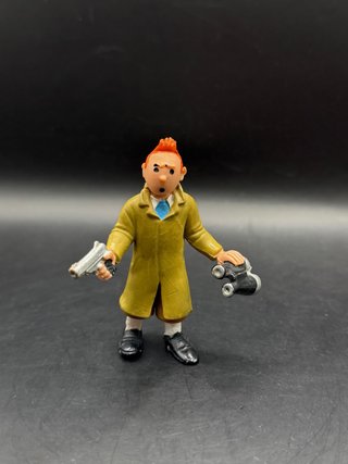 Figura PVC Tintín con Pistola y Prismáticos