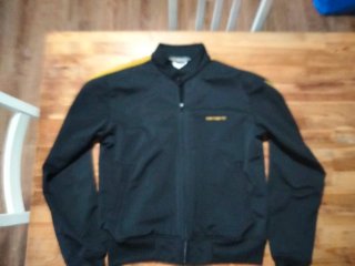 Chaqueta Carhartt Negra y Dorada