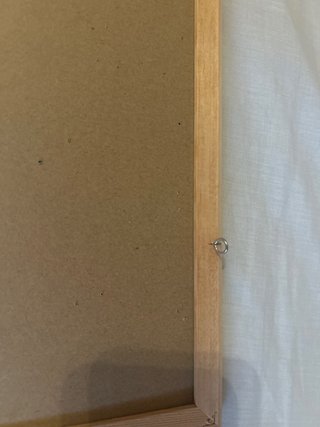 Tablero de corcho con marco de madera