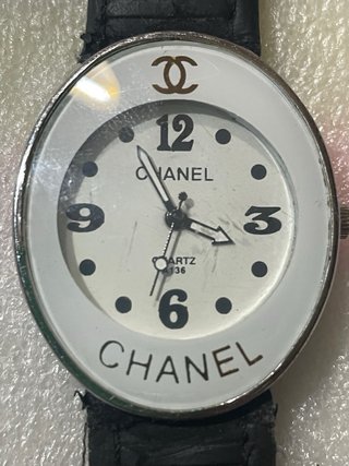Reloj Chanel quartz,señora pulsera cuero negro