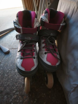 Patines en línea Oxelo rosas y blancos